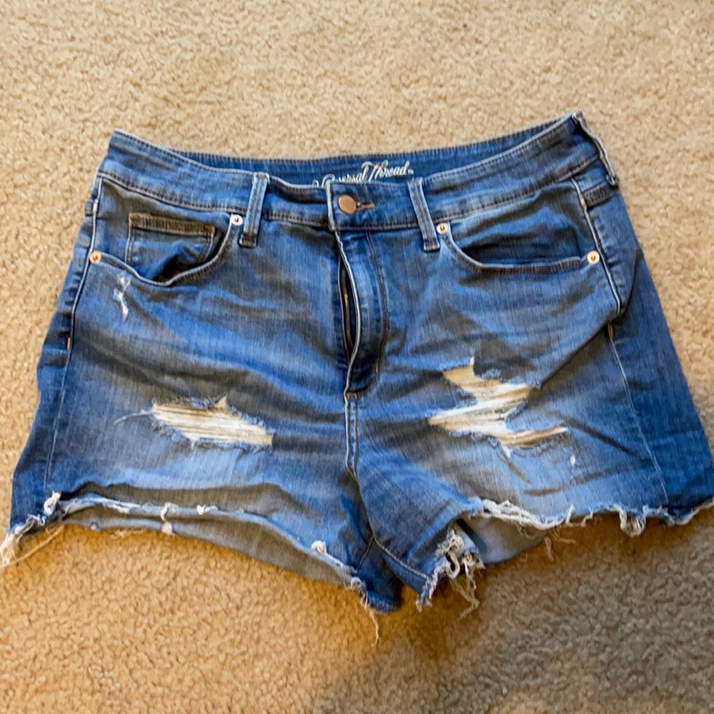 Universal thread distressed cutoff denim shorts.
